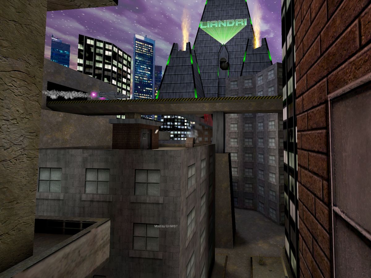 The Liandri tower and city skyline from the Unreal Tournament intro, rendered on a Quest 3 under a purple night sky.